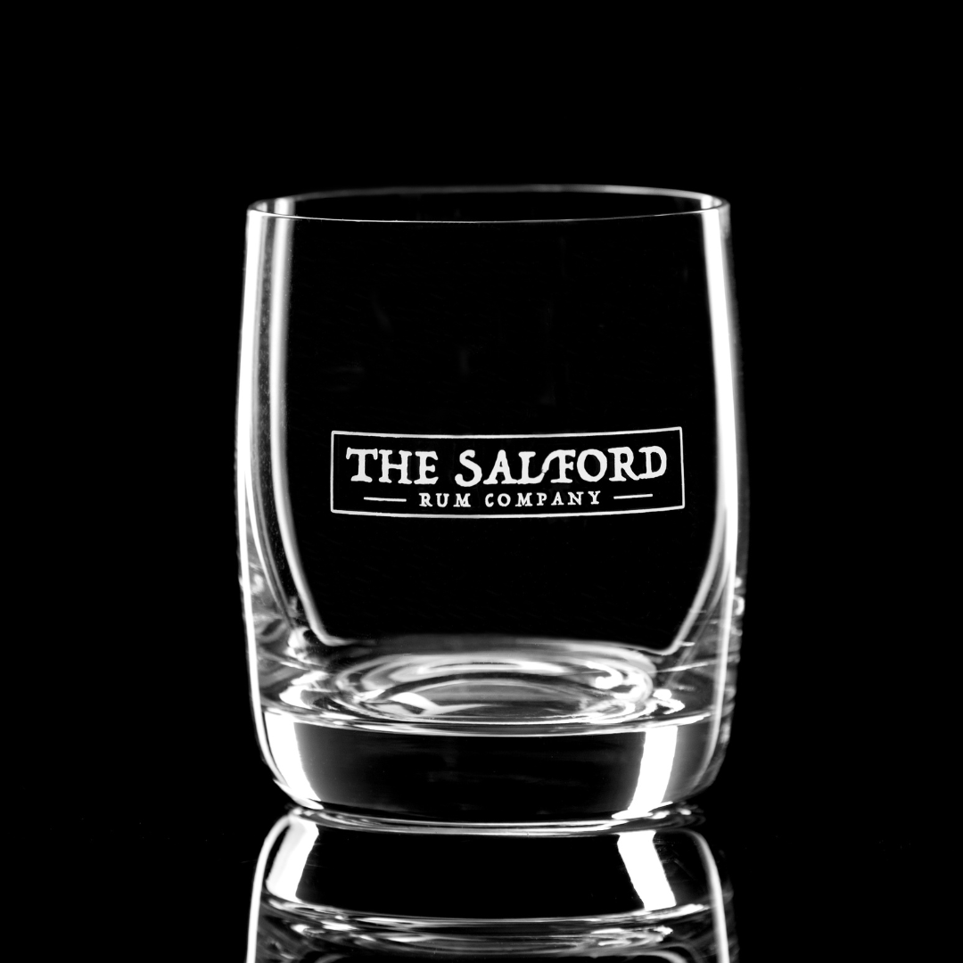 Salford Rum Glencairn crystal tumbler glass on wooden surface