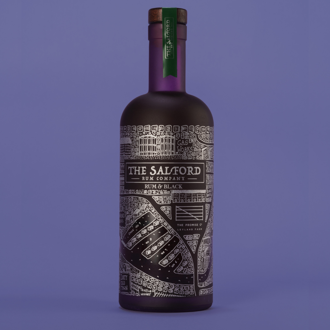 Salford Rum and Black 70cl glass bottle with silver map design against a purple background.