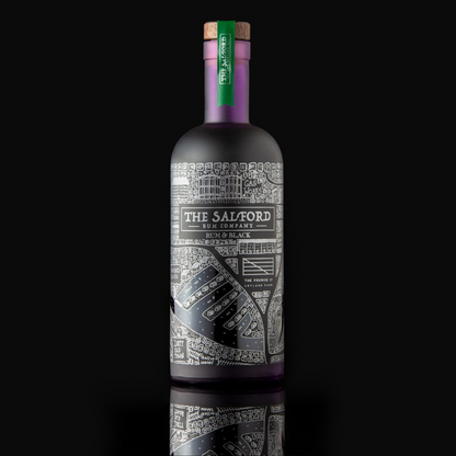 Front view of the matte purple Salford Rum and Black bottle with a green seal and wooden stopper.