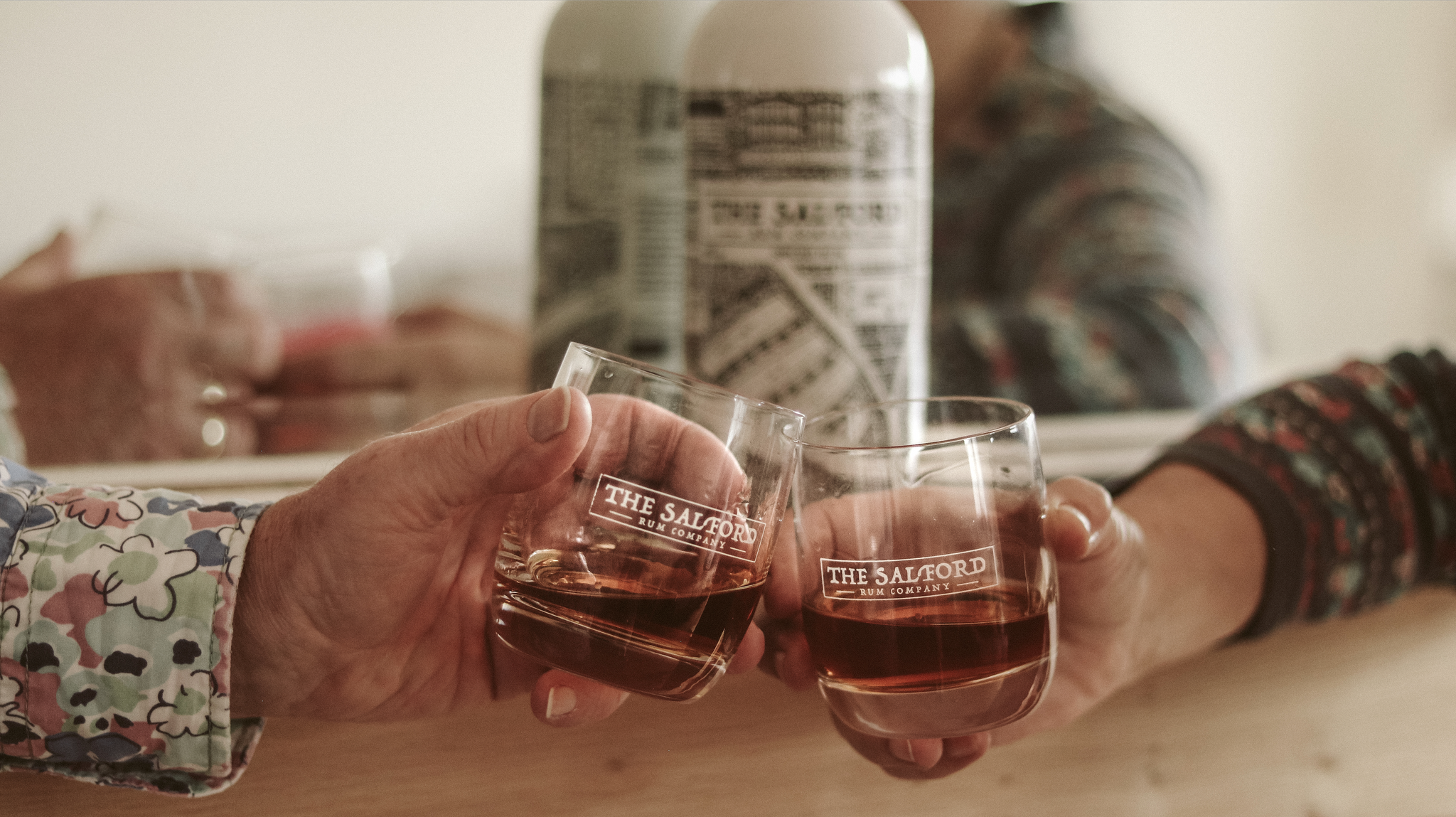 Salford Rum tumbler glass with rum poured over ice